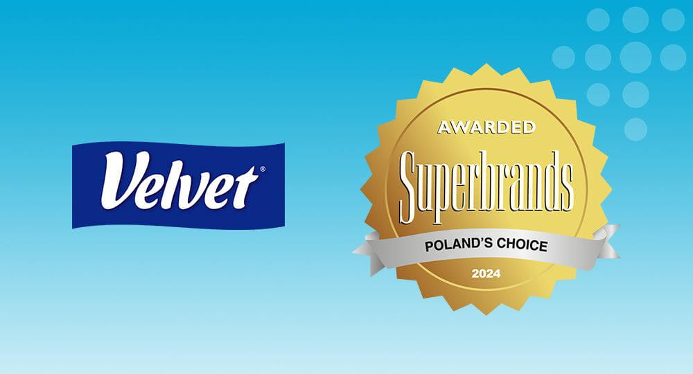 Logo marki Velvet oraz znaku Superbrands 2024 na niebieskim tle.